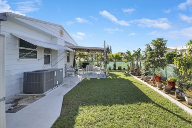 This beautifully updated 2-bedroom, 2-bathroom split-floor plan on Heritage Ridge Golf Club in Florida - for sale on GolfHomes.com, golf home, golf lot