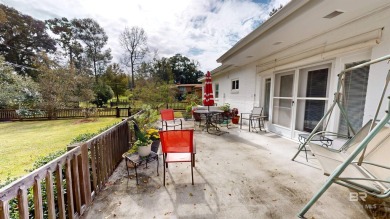 Welcome to this stunning Mid-Century home, a rare find in Yester on Spring Hill College Golf Course in Alabama - for sale on GolfHomes.com, golf home, golf lot