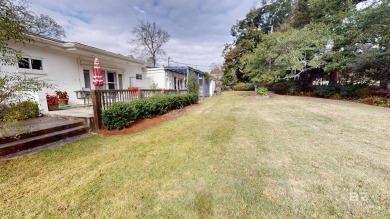 Welcome to this stunning Mid-Century home, a rare find in Yester on Spring Hill College Golf Course in Alabama - for sale on GolfHomes.com, golf home, golf lot