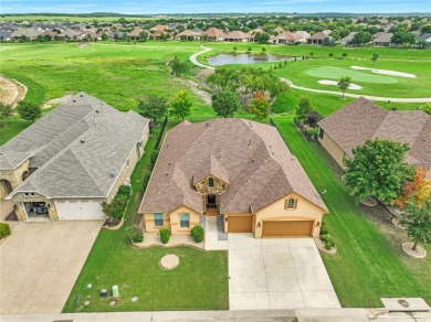 Indulge in the ultimate lifestyle at this meticulously on Wildhorse Golf Club of Robson Ranch in Texas - for sale on GolfHomes.com, golf home, golf lot