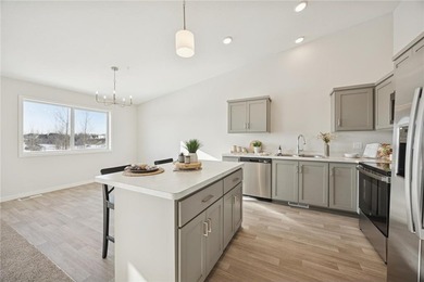 Welcome home to this stunning townhome built by local builder on Territory Golf Club in Minnesota - for sale on GolfHomes.com, golf home, golf lot