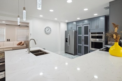 Spectacular fully renovated& fully furnished single-family home on BallenIsles Golf and Country Club in Florida - for sale on GolfHomes.com, golf home, golf lot