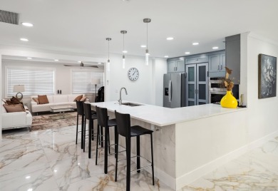 Spectacular fully renovated& fully furnished single-family home on BallenIsles Golf and Country Club in Florida - for sale on GolfHomes.com, golf home, golf lot