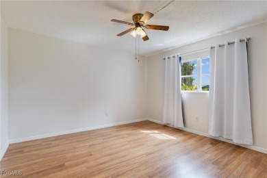 Discover this unbeatable first-floor LAKE view condo in the on Cypress Lake Country Club in Florida - for sale on GolfHomes.com, golf home, golf lot