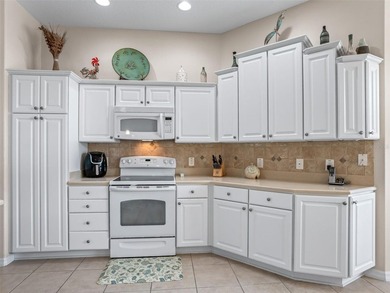 Welcome to this beautifully maintained Gardenia model located on on Glenview Championship Golf and Country Club in Florida - for sale on GolfHomes.com, golf home, golf lot