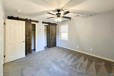 A Stunning 4 bedroom home that sits on an oversized corner lot on Burningtree Country Club in Alabama - for sale on GolfHomes.com, golf home, golf lot