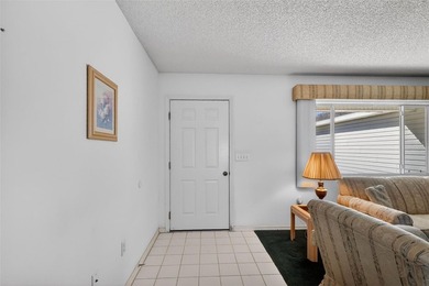 WONDERFUL 2-bedroom, 2-bath home featuring a 17'x10' ENCLOSED on The Links of Spruce Creek in Florida - for sale on GolfHomes.com, golf home, golf lot