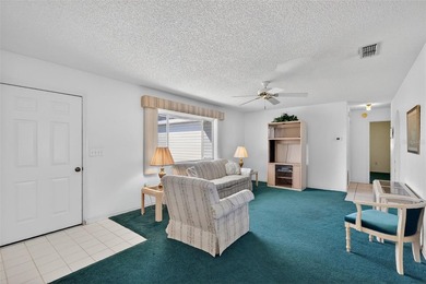 WONDERFUL 2-bedroom, 2-bath home featuring a 17'x10' ENCLOSED on The Links of Spruce Creek in Florida - for sale on GolfHomes.com, golf home, golf lot