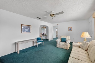 WONDERFUL 2-bedroom, 2-bath home featuring a 17'x10' ENCLOSED on The Links of Spruce Creek in Florida - for sale on GolfHomes.com, golf home, golf lot