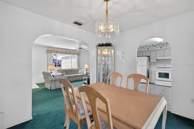 WONDERFUL 2-bedroom, 2-bath home featuring a 17'x10' ENCLOSED on The Links of Spruce Creek in Florida - for sale on GolfHomes.com, golf home, golf lot