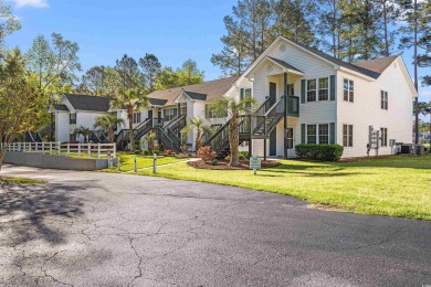 This great first floor end unit, with a large screened in back on Palmetto Greens Golf and Country Club in South Carolina - for sale on GolfHomes.com, golf home, golf lot