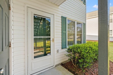 This great first floor end unit, with a large screened in back on Palmetto Greens Golf and Country Club in South Carolina - for sale on GolfHomes.com, golf home, golf lot
