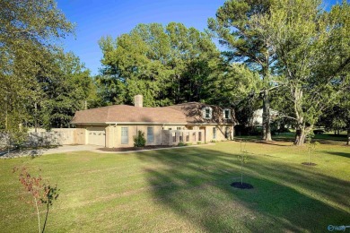 A Stunning 4 bedroom home that sits on an oversized corner lot on Burningtree Country Club in Alabama - for sale on GolfHomes.com, golf home, golf lot