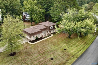 A Stunning 4 bedroom home that sits on an oversized corner lot on Burningtree Country Club in Alabama - for sale on GolfHomes.com, golf home, golf lot