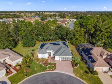 This spacious updated HAMPTON model is located on a cul-de-sac on Eagle Ridge At Spruce Creek Country Club in Florida - for sale on GolfHomes.com, golf home, golf lot