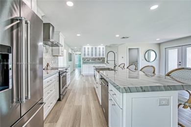 Welcome to 1073 Sand Castle Rd -- a fully renovated on The Dunes Golf and Tennis Club in Florida - for sale on GolfHomes.com, golf home, golf lot