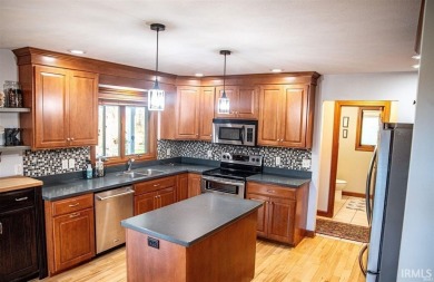 Located on Heron Creek Golf Course, this home is a must-see! on Heron Creek Golf Club in Indiana - for sale on GolfHomes.com, golf home, golf lot