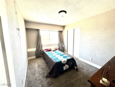 The home has undergone recent renovations, featuring updated on Desert Rose Golf Course in Nevada - for sale on GolfHomes.com, golf home, golf lot