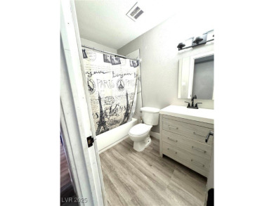 The home has undergone recent renovations, featuring updated on Desert Rose Golf Course in Nevada - for sale on GolfHomes.com, golf home, golf lot