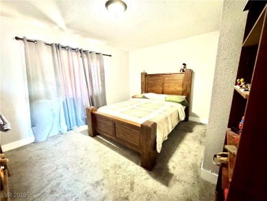 The home has undergone recent renovations, featuring updated on Desert Rose Golf Course in Nevada - for sale on GolfHomes.com, golf home, golf lot