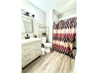 The home has undergone recent renovations, featuring updated on Desert Rose Golf Course in Nevada - for sale on GolfHomes.com, golf home, golf lot