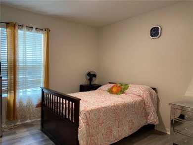 Immaculately maintained as new, built in 2021, this 4-bedroom on Lake Diamond Golf and Country Club in Florida - for sale on GolfHomes.com, golf home, golf lot