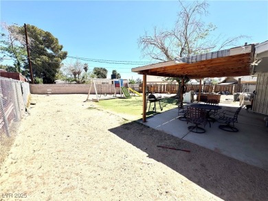 The home has undergone recent renovations, featuring updated on Desert Rose Golf Course in Nevada - for sale on GolfHomes.com, golf home, golf lot