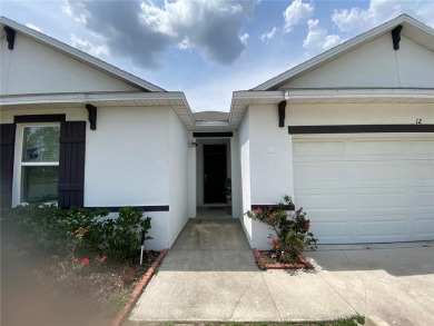 Immaculately maintained as new, built in 2021, this 4-bedroom on Lake Diamond Golf and Country Club in Florida - for sale on GolfHomes.com, golf home, golf lot