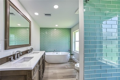 Welcome to 1073 Sand Castle Rd -- a fully renovated on The Dunes Golf and Tennis Club in Florida - for sale on GolfHomes.com, golf home, golf lot