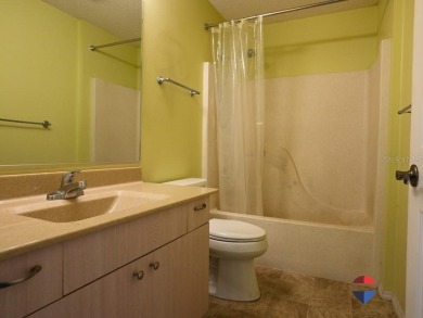 Welcome to this charming 2-bedroom, 2-bathroom fully furnished on The Links of Spruce Creek in Florida - for sale on GolfHomes.com, golf home, golf lot