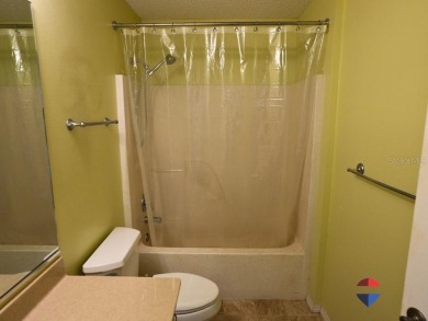 Welcome to this charming 2-bedroom, 2-bathroom fully furnished on The Links of Spruce Creek in Florida - for sale on GolfHomes.com, golf home, golf lot