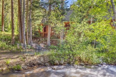 This secluded log home is a sanctuary from the world, with on The River Course At Keystone in Colorado - for sale on GolfHomes.com, golf home, golf lot