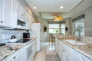 Enjoy breathtaking views from this 3rd-floor Brookside model on Heritage Palms Golf and Country Club in Florida - for sale on GolfHomes.com, golf home, golf lot