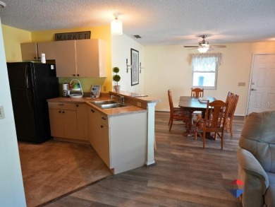 Welcome to this charming 2-bedroom, 2-bathroom fully furnished on The Links of Spruce Creek in Florida - for sale on GolfHomes.com, golf home, golf lot