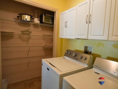 Welcome to this charming 2-bedroom, 2-bathroom fully furnished on The Links of Spruce Creek in Florida - for sale on GolfHomes.com, golf home, golf lot