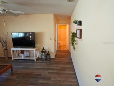 Welcome to this charming 2-bedroom, 2-bathroom fully furnished on The Links of Spruce Creek in Florida - for sale on GolfHomes.com, golf home, golf lot