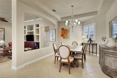 This well-cared for Coach Home features stainless steel on Quail West Golf and Country Club in Florida - for sale on GolfHomes.com, golf home, golf lot