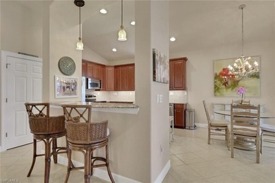 This well-cared for Coach Home features stainless steel on Quail West Golf and Country Club in Florida - for sale on GolfHomes.com, golf home, golf lot