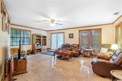 Stately Mid Century Modern 4-bedroom home situated on a wooded on Covington Country Club in Louisiana - for sale on GolfHomes.com, golf home, golf lot