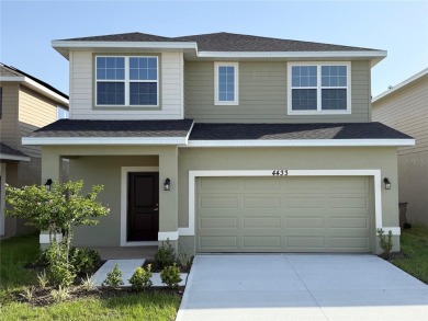 This brand new 4 bedroom, 2.5 bathroom residence offers on Harmony Golf Preserve in Florida - for sale on GolfHomes.com, golf home, golf lot