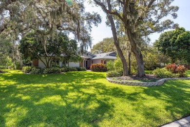 Welcome to your new home in one of Dunedin's premier on The Dunedin Country Club in Florida - for sale on GolfHomes.com, golf home, golf lot