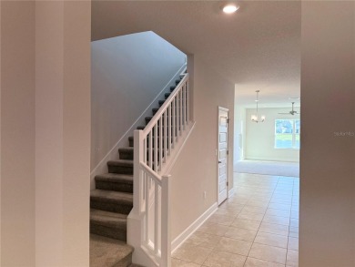 This brand new 4 bedroom, 2.5 bathroom residence offers on Harmony Golf Preserve in Florida - for sale on GolfHomes.com, golf home, golf lot