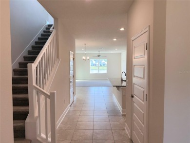This brand new 4 bedroom, 2.5 bathroom residence offers on Harmony Golf Preserve in Florida - for sale on GolfHomes.com, golf home, golf lot
