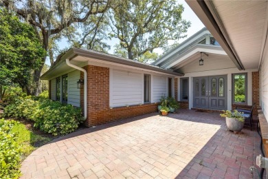 Welcome to your new home in one of Dunedin's premier on The Dunedin Country Club in Florida - for sale on GolfHomes.com, golf home, golf lot