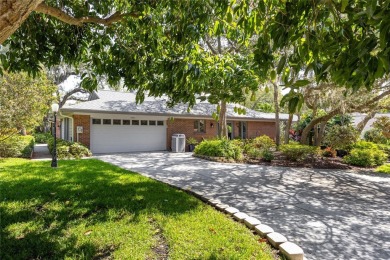 Welcome to your new home in one of Dunedin's premier on The Dunedin Country Club in Florida - for sale on GolfHomes.com, golf home, golf lot
