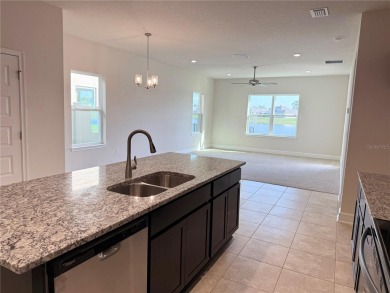 This brand new 4 bedroom, 2.5 bathroom residence offers on Harmony Golf Preserve in Florida - for sale on GolfHomes.com, golf home, golf lot