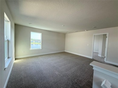 This brand new 4 bedroom, 2.5 bathroom residence offers on Harmony Golf Preserve in Florida - for sale on GolfHomes.com, golf home, golf lot