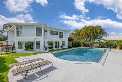 This One of a Kind Fully Renovated 5 Bedroom, 4 Bath Pool Home on BallenIsles Golf and Country Club in Florida - for sale on GolfHomes.com, golf home, golf lot