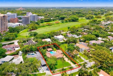 Set on an oversized 17,100-square-foot lot, nestled just around on Granada Golf Club in Florida - for sale on GolfHomes.com, golf home, golf lot