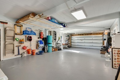 This One of a Kind Fully Renovated 5 Bedroom, 4 Bath Pool Home on BallenIsles Golf and Country Club in Florida - for sale on GolfHomes.com, golf home, golf lot